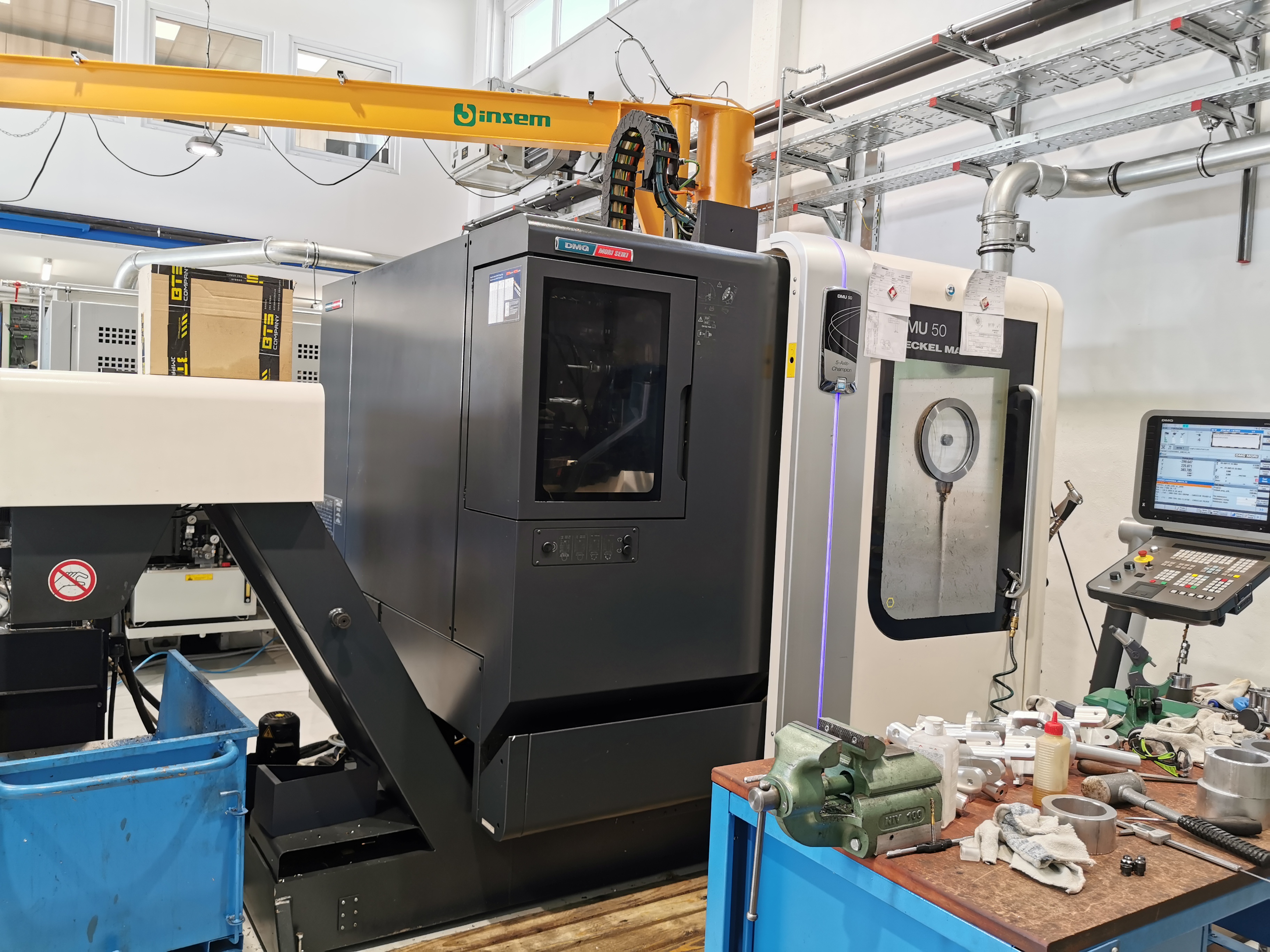 DMG + Deckel Maho MU 50 — 5-osni rezkalni center